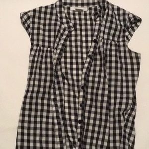 Charlotte Russe black and white checkered vest.